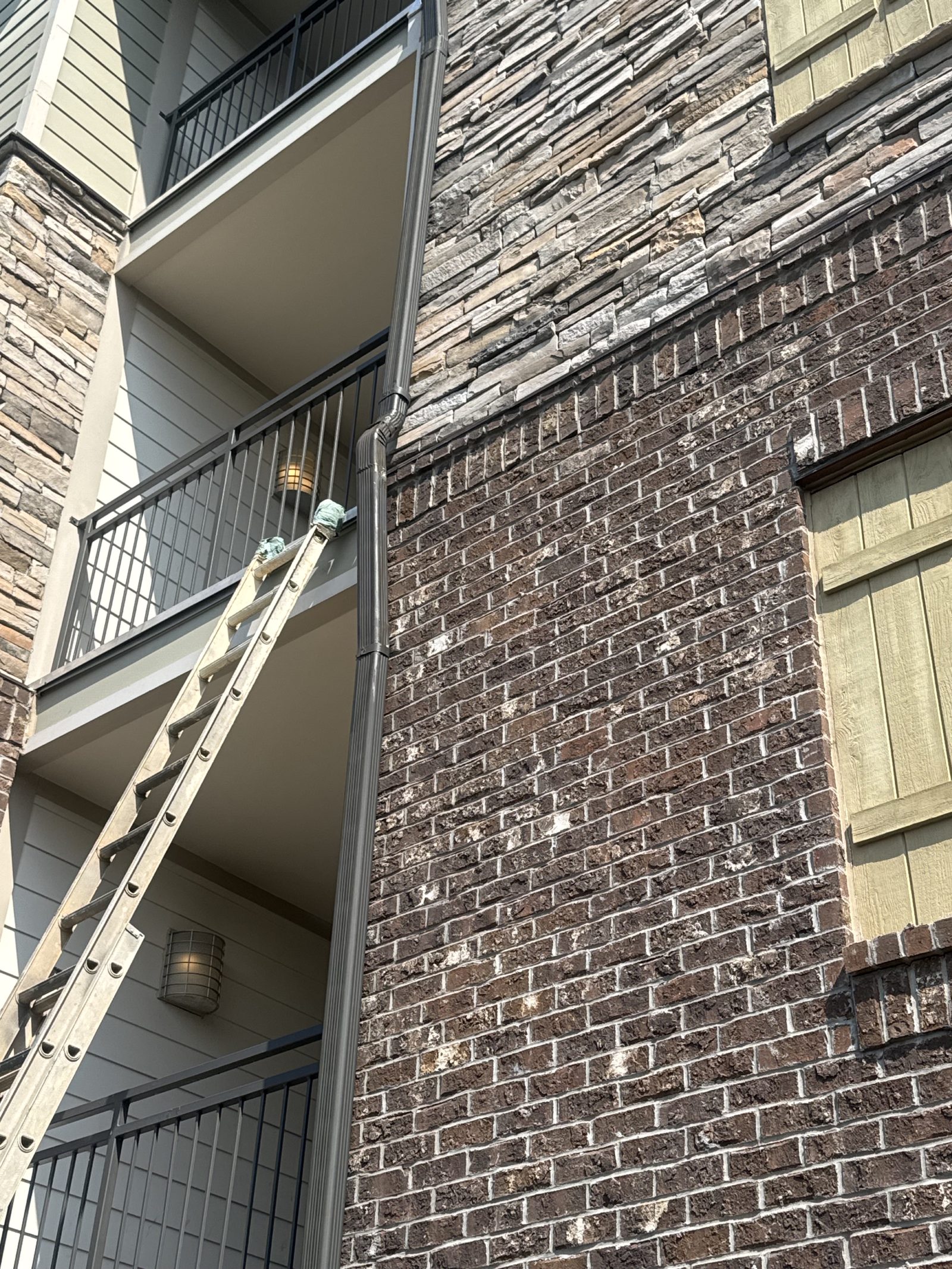 Multifamily exterior gutter and downspout repair