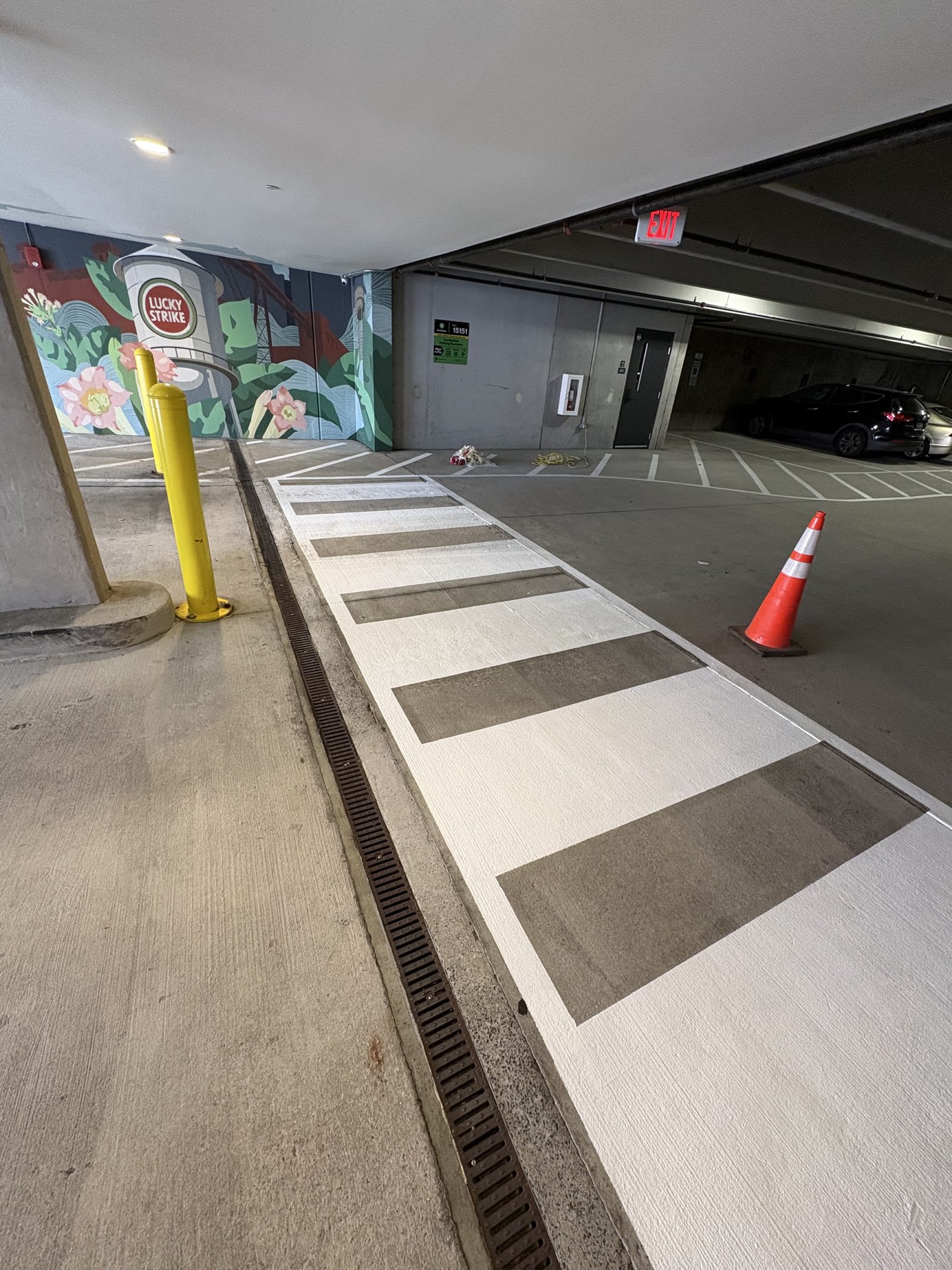 Parking garage crosswalk after line striping refresh